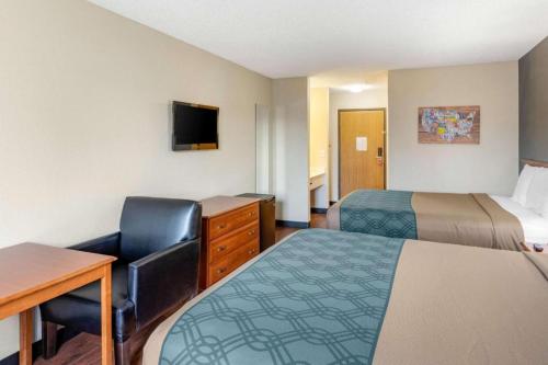 Ένα ή περισσότερα κρεβάτια σε δωμάτιο στο Econo Lodge Longmont East