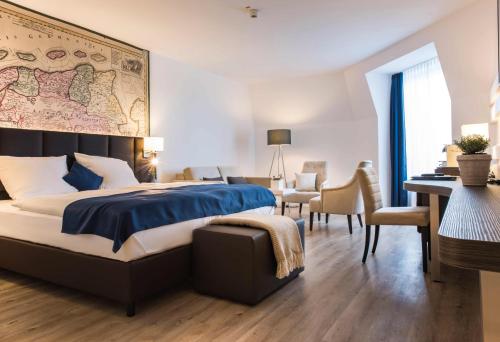 Postel nebo postele na pokoji v ubytování Hotel Novum