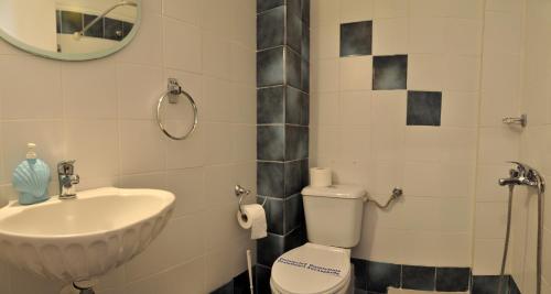 Ett badrum på Hotel Pighi