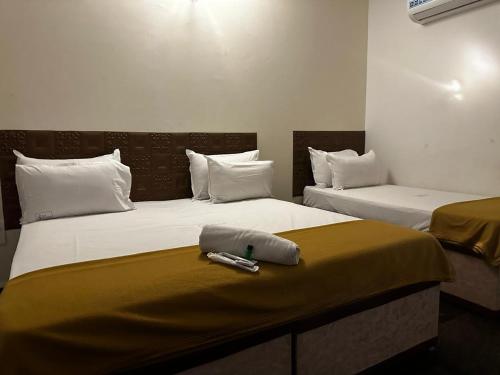 Cama o camas de una habitación en MPS Sai Palace