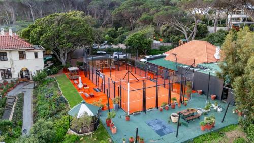 an overhead view of a house with an orange building at Camps Bay Retreat Hotel in Cape Town