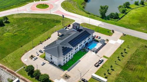 an overhead view of a large building with a roof at Sleep Inn & Suites Norman near University in Norman