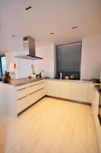 Η κουζίνα ή μικρή κουζίνα στο Triton Suite