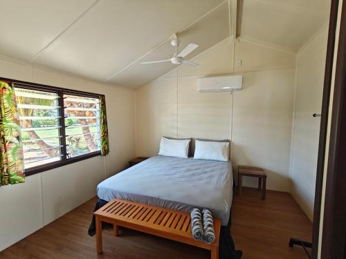Voodi või voodid majutusasutuse Sunset Bungalows toas