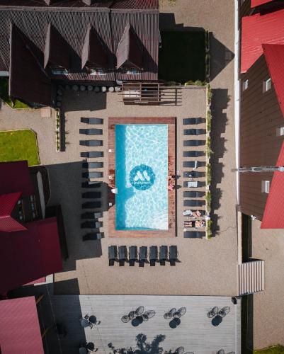 an overhead view of a swimming pool in a house at Gremi Hotel in Dragobrat