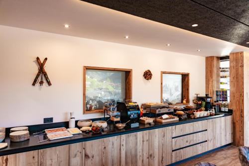 Kuchyň nebo kuchyňský kout v ubytování Dolomites Room and Breakfast Formiè