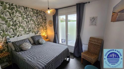 Postel nebo postele na pokoji v ubytování EntreLac&Océan3 - entrée et terrasse privée
