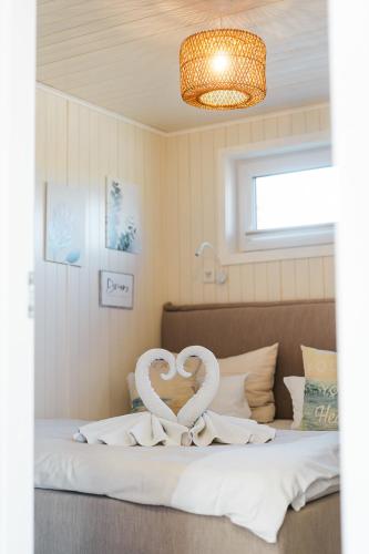 Postel nebo postele na pokoji v ubytování Lieblingsplatz Parey - Ferienhaus Deluxe