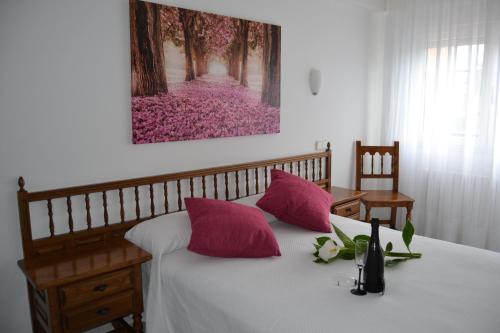 Katil atau katil-katil dalam bilik di Hostal Pereiriña