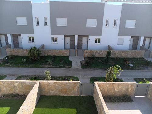 a view of a building with a courtyard at Chalet Zahara Beach in Zahara de los Atunes