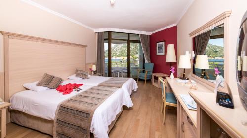 Кровать или кровати в номере Hotel Aqua