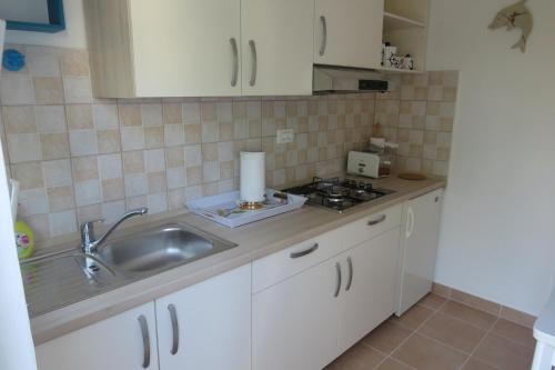ครัวหรือมุมครัวของ Apartment Casetta