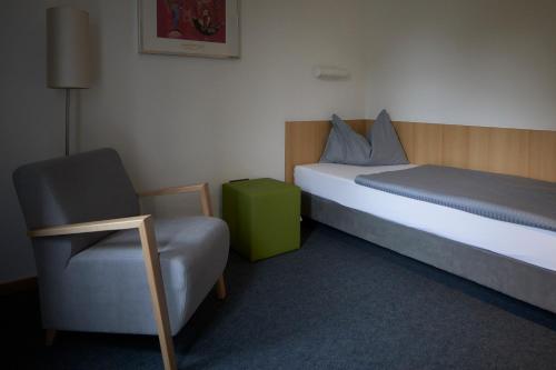 Un ou plusieurs lits dans un hébergement de l'établissement bfwhotel und Tagungszentrum