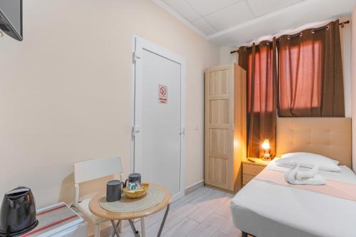 Postel nebo postele na pokoji v ubytování 7A Hostal