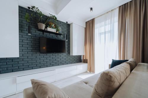 Ruang duduk di Top-floor 1BR Full equipped in Riscani Chisinau