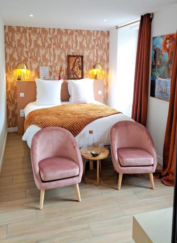 Ein Bett oder Betten in einem Zimmer der Unterkunft Le Foyer Celtique