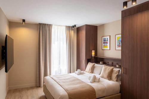 Ένα ή περισσότερα κρεβάτια σε δωμάτιο στο Sol hotel St Mande - 2 personnes - 20