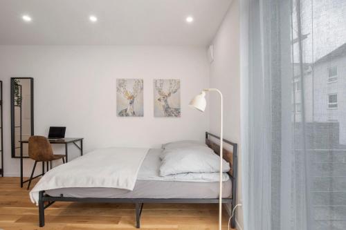 Ένα ή περισσότερα κρεβάτια σε δωμάτιο στο Global Bnb - Ay Homes