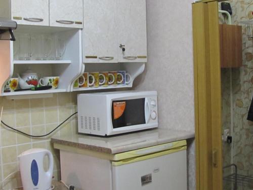Apartments on ul Kirova 13 tesisinde mutfak veya mini mutfak