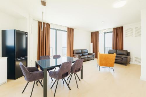 Χώρος καθιστικού στο Queen's Park Residence Apartments