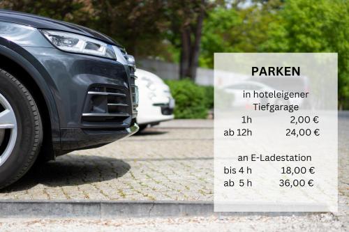 a sign in a parking lot next to a car at Kongresshotel Potsdam am Templiner See in Potsdam