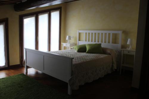 Postel nebo postele na pokoji v ubytování Lady Frantoio Toscano
