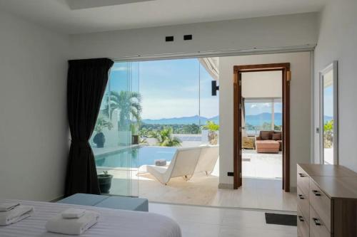 Voodi või voodid majutusasutuse Luxurious 3br Villa Malina Sea & Jungle Views toas