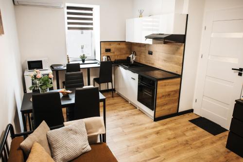 Apartmány pod zvonicí