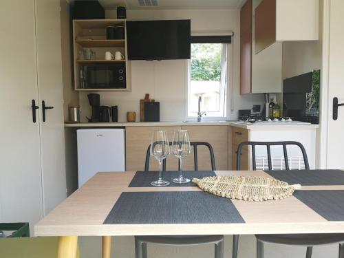 Una cocina o zona de cocina en Tiny Haus am Wallersee