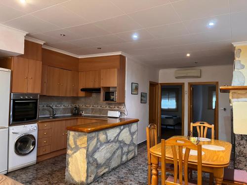Kuchyň nebo kuchyňský kout v ubytování Casa Caloret 2min de la playa y del centro