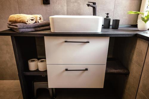 Apartmány pod zvonicíにあるキッチンまたは簡易キッチン