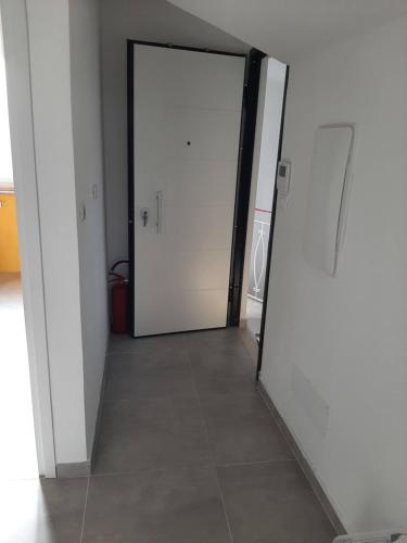 an open door in a room with a tile floor at Terrazza Dante in San Vito Chietino