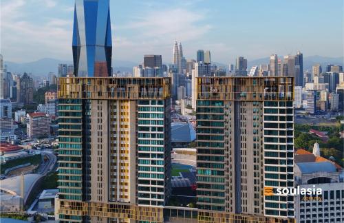 a view of a city with tall buildings at Opus by Soulasia in Kuala Lumpur