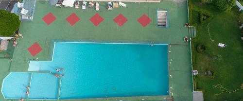 an overhead view of a swimming pool in a park at Hotel Santomé in Sanxenxo