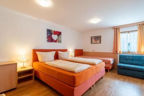 Postel nebo postele na pokoji v ubytování Landhaus Beate