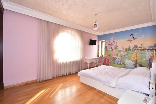 Llit o llits en una habitació de Uptown Pool Villa