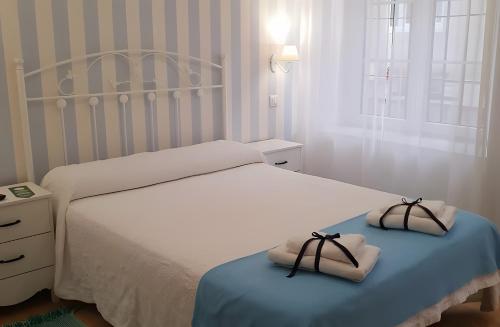 Postel nebo postele na pokoji v ubytování El Refugio Alojamiento Rural