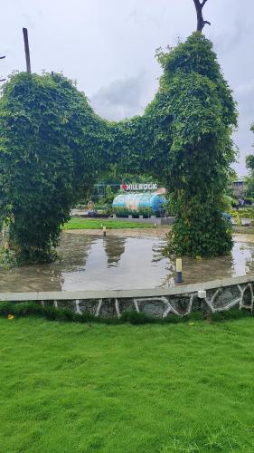 a sculpture of a dog in a park at HillRock Resort & Villas, Neral-Karjat in Karjat