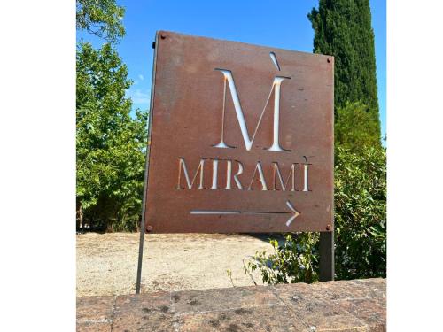 a sign with the name of a m imprint on it at B&B Villa Miramì in Saturnia
