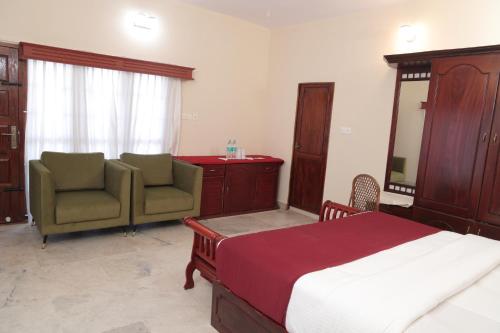 Letto o letti in una camera di Hillview Beach Resort