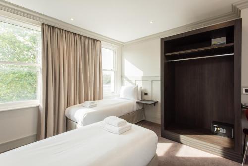 Katil atau katil-katil dalam bilik di Mowbray Court Hotel