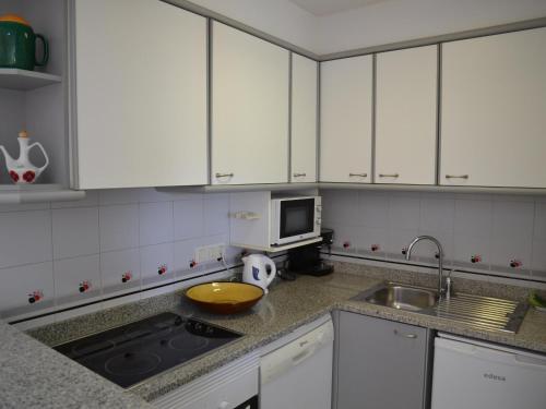 Appartement familial à L'Estartit avec piscine, près de la plage