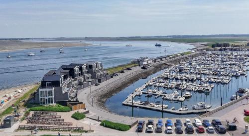 an aerial view of a marina with boats in the water at Vakantiewoning aan het water - met 2 balkons - Vista Maris - Nr 22 in Sint Annaland