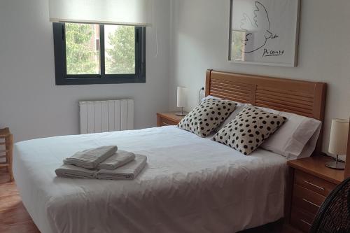 Ένα ή περισσότερα κρεβάτια σε δωμάτιο στο Apartamento O Mon