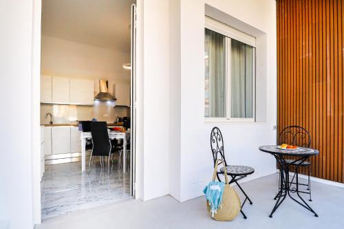 Η κουζίνα ή μικρή κουζίνα στο Nettuno80 1 by Casa di Marco AP37