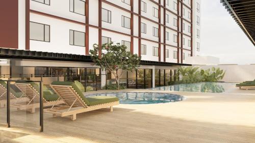 a rendering of a hotel patio with chairs and a pool at Seda Centrio Newly Renovated in Cagayan de Oro
