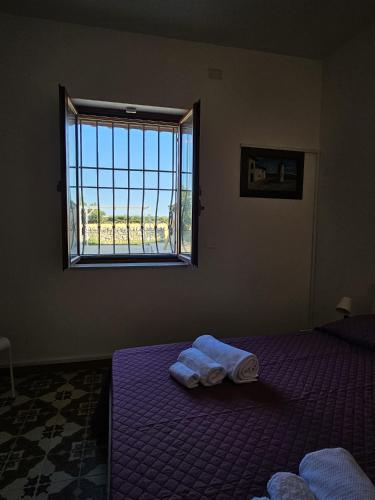 Cama o camas de una habitación en Porta di Ferro