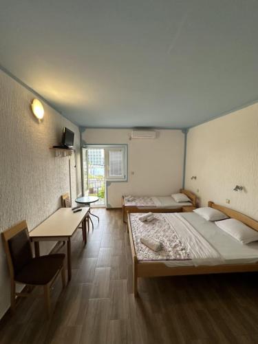 Ένα ή περισσότερα κρεβάτια σε δωμάτιο στο Atlantic-Moj market