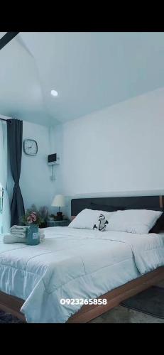 Ένα ή περισσότερα κρεβάτια σε δωμάτιο στο Napa Homestay