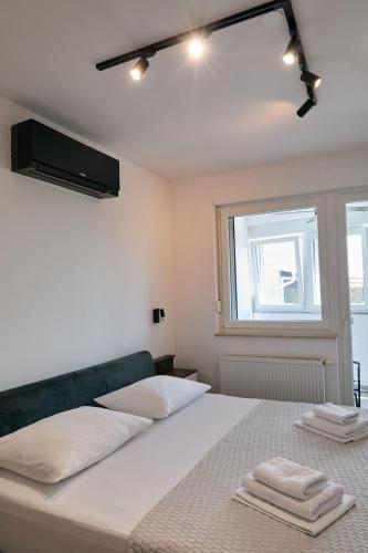 Katil atau katil-katil dalam bilik di OSIJEK LUXURY CENTER - self check in, Ulica I Gunulića 82